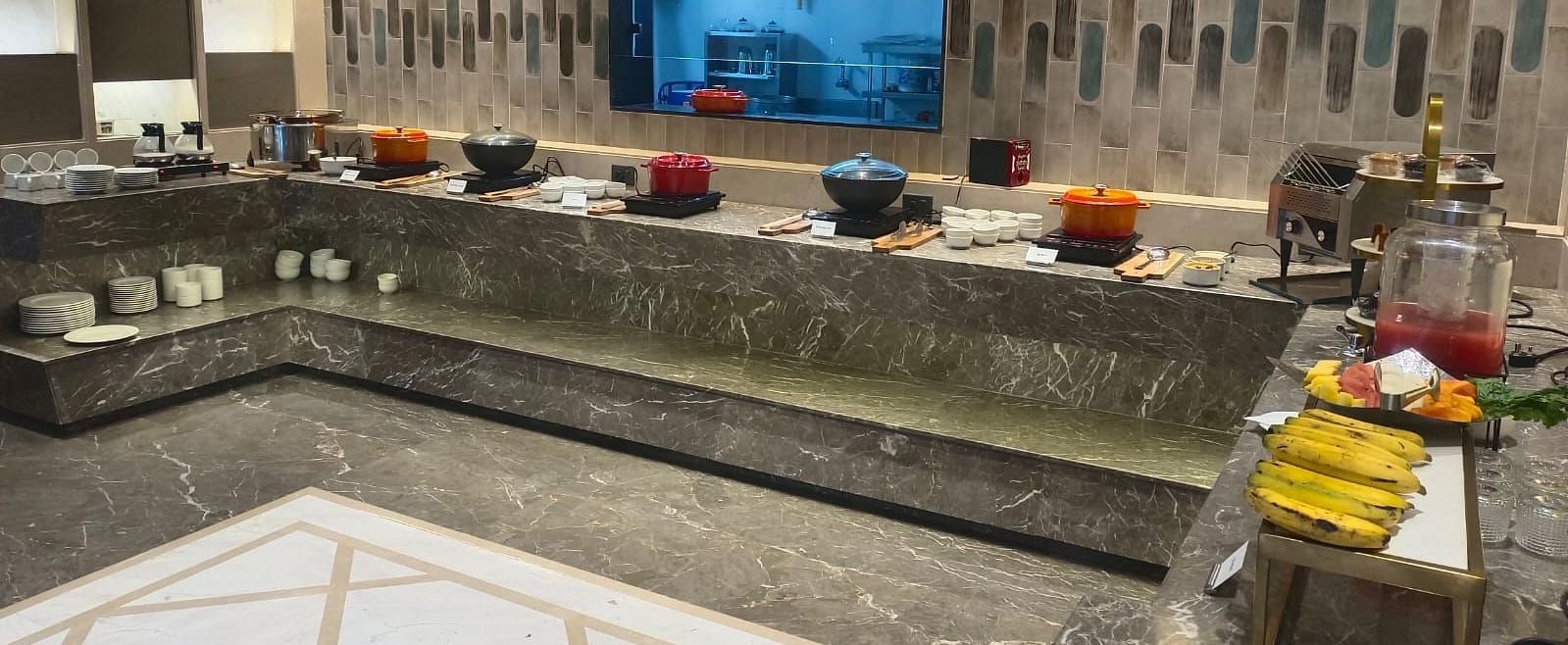 A vibrant buffet spread featuring a variety of dishes, desserts, and fresh fruits at  A vibrant buffet spread featuring a variety of dishes, desserts, and fresh fruits.